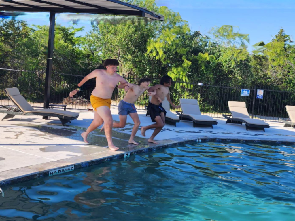 batl ranch pool several people having fun sunny day