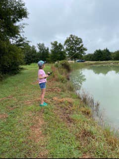 fishing pond young girl fishing